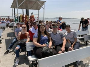 Students on top deck of Ellis Island Ferry