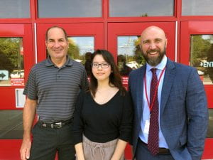 NMS Semifinalist Hannah Ahn with school counselor Randy Altman and Principal Rudy Arietta