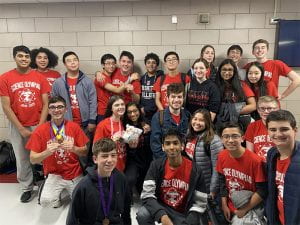 Group photo of TZHS Science Olympiad team with medals
