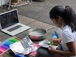Student conducting outdoor experiment