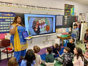 Teacher Jaclyn Nandlal teaches class about Diwali