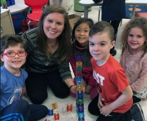 Material science engineer building maze with first-grade students